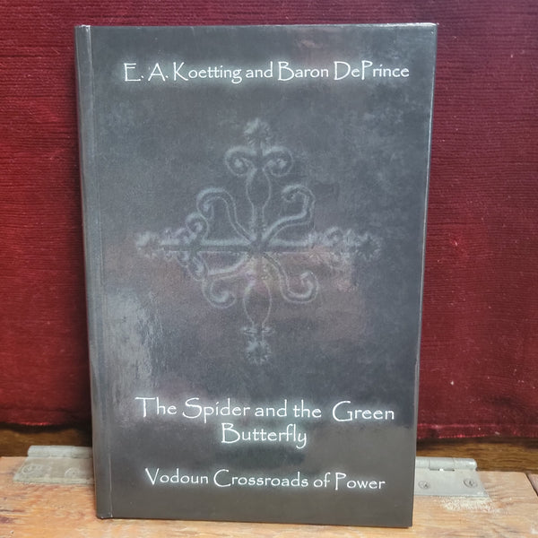 THE SPIDER AND THE GREEN BUTTERFLY